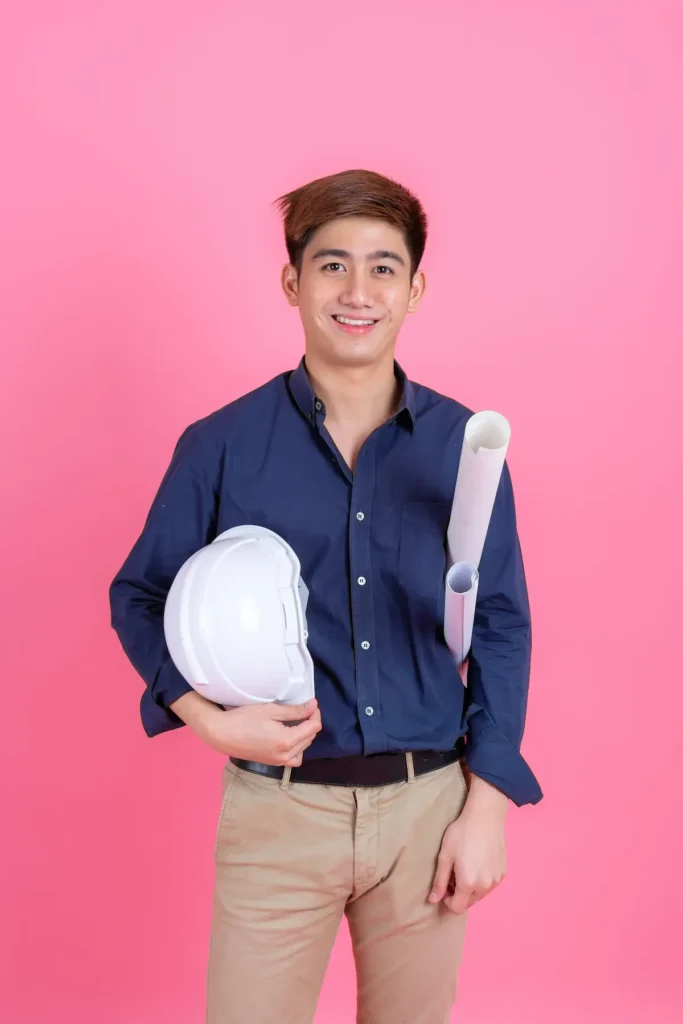 Professional man in blue shirt carrying his work tools