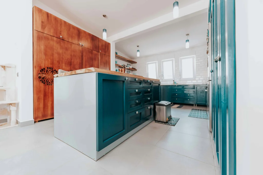 Blue and white kitchen design with a mix of wood