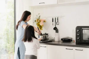 Asian mom in the kitchen cooking